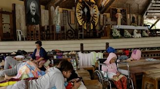 'All in God's hands': Volcano evacuees hunker down in Philippines