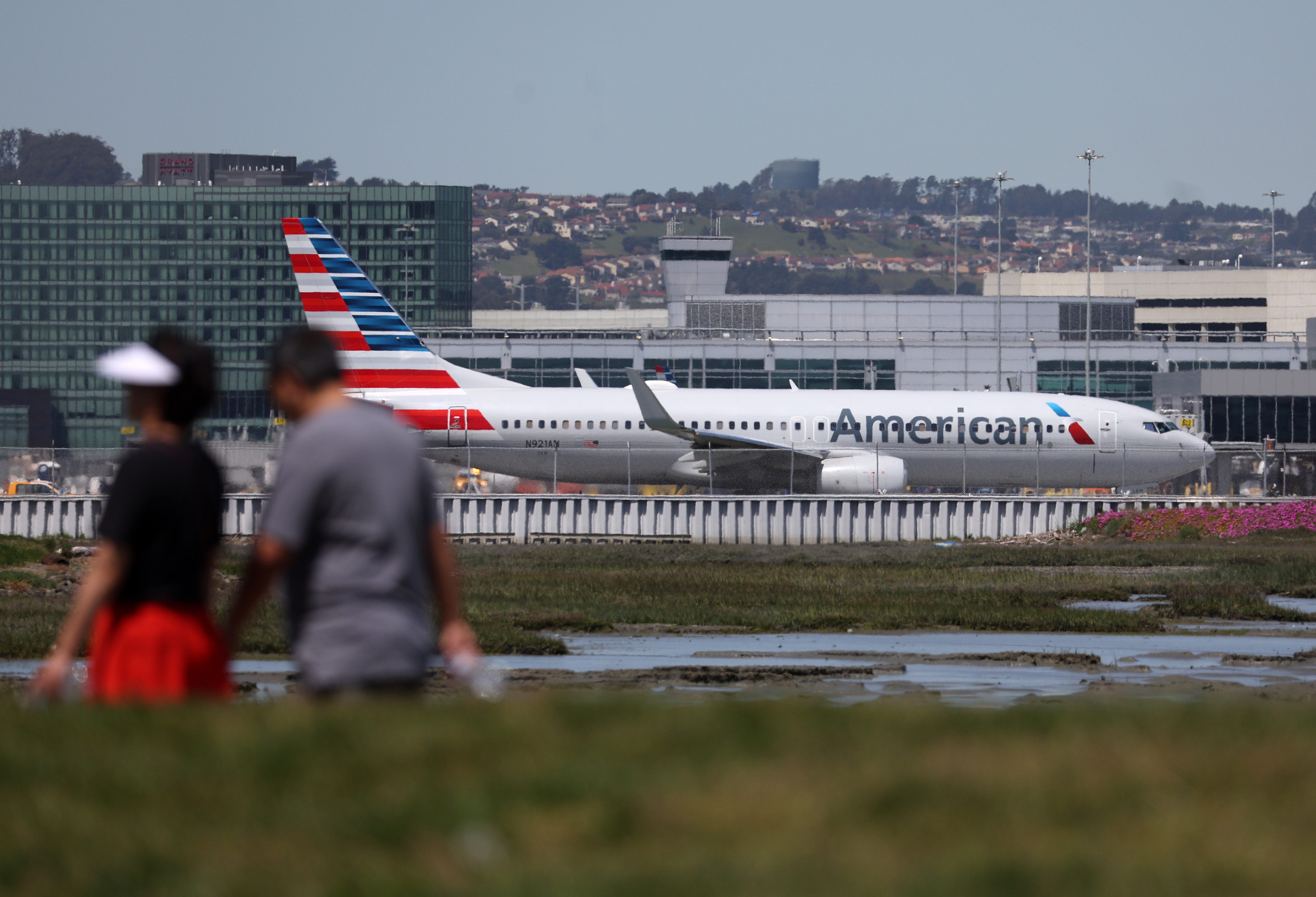 Smoke in cabin after American Airlines flight lands in San Francisco; plane evacuated