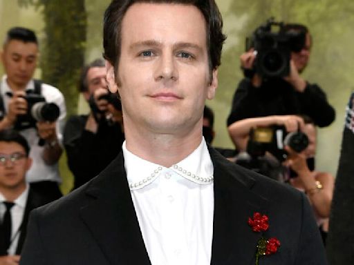 Jonathan Groff sports flower-adorned suit at 2024 Met Gala; Esquire and British GQ approve