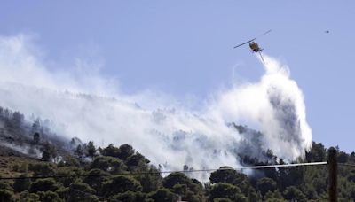 Two wildfires are burning near Greece’s capital, fueled by strong winds