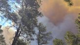 Thousands flee New Mexico wildfires that have damaged 500 structures; governor declares emergency