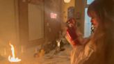 Taylor Swift captured on video putting out a fire in her NYC apartment: ‘Our purses are ruined’