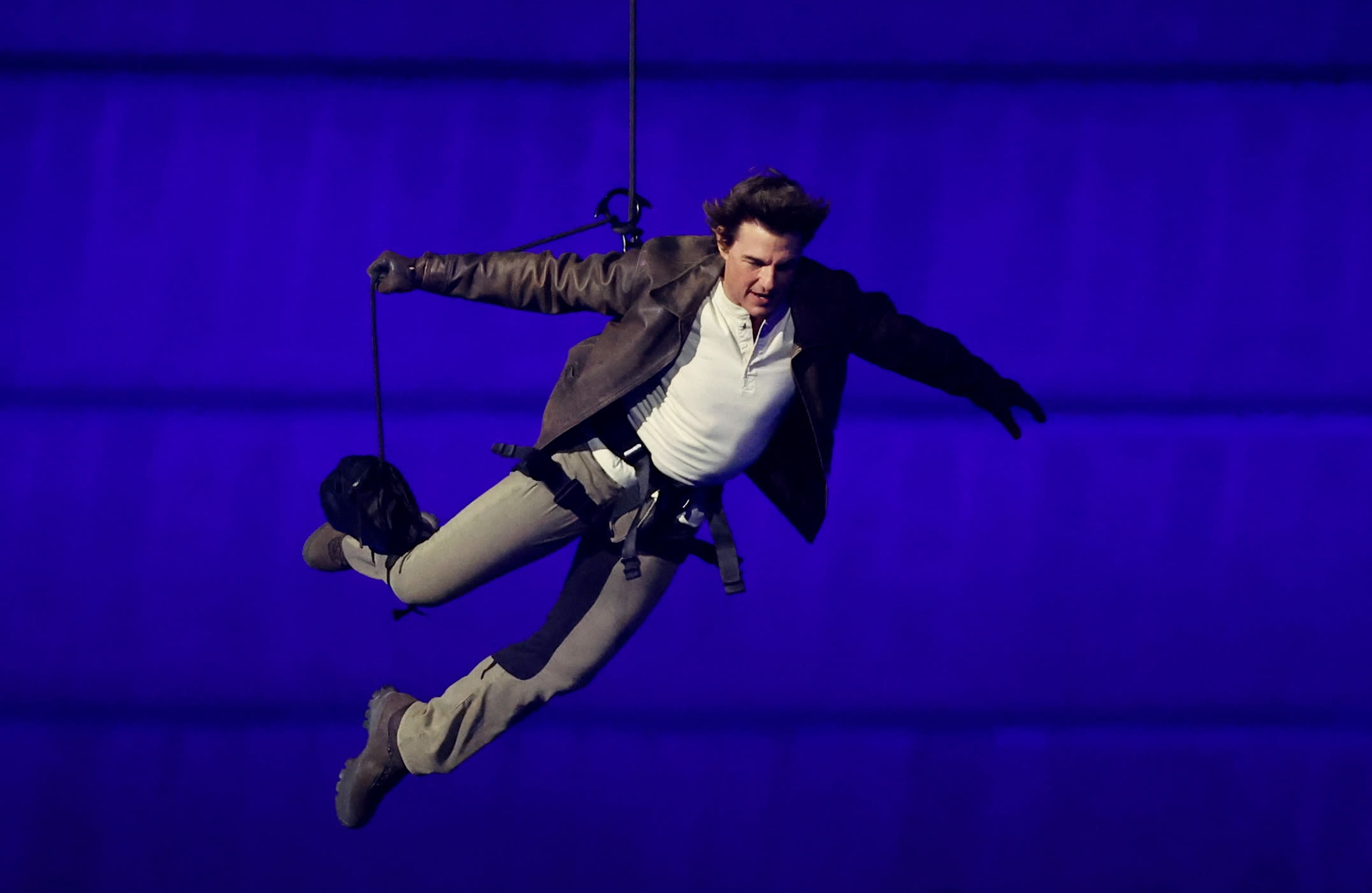 Tom Cruise Jumps Off Stade de France and Skydives to Hollywood Sign at Olympics Closing Ceremony, Handing Over Games to L.A.