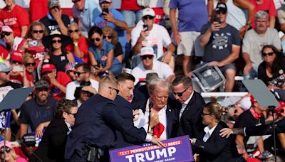 Trump appears with bandaged ear at convention; names running mate - BusinessWorld Online