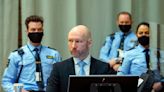 Mass killer who says his rights are violated should remain in solitary confinement, Norway says