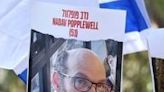 A poster with the portrait of Nadav Popplewell at an Israeli rally calling for the release of hostages, in February