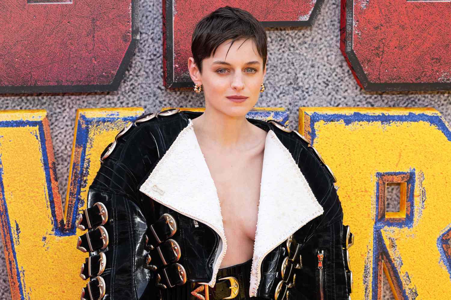 Emma Corrin Goes Topless in Risky Schiaparelli Look at 'Deadpool & Wolverine' Event