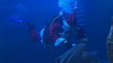 WATCH: Santa Claus brings Christmas gifts to the sea world of a German aquarium