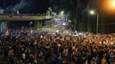 Protesters throng streets of Georgia's capital after parliament passes so-called 'Russian law'