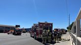 Phoenix Fire Department evacuates neighborhood, school after car crashed into gas main