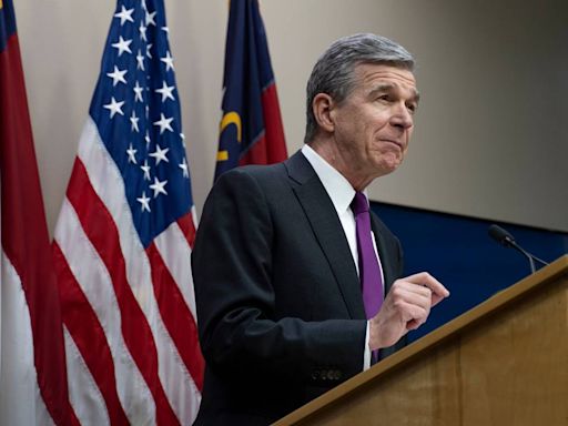 Gov. Roy Cooper issues 4 pardons and reduces sentences of 4 NC prisoners