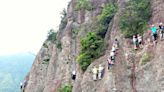 Crowded Climbers Stranded on Cliffside for Over an Hour