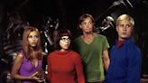Sarah Michelle Gellar says 'Scooby-Doo' was originally 'less family-friendly,' but a 'steamy' kiss between Velma and Daphne and tease about Fred's sexuality were cut