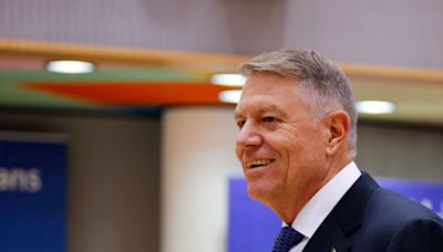 Romanian president quits NATO chief race, clearing way for Rutte