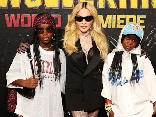 Madonna Suits Up in Saint Laurent Tuxedo With Twin Daughters in ’90s-inspired Streetwear Looks at ‘Deadpool & Wolverine’ Premiere