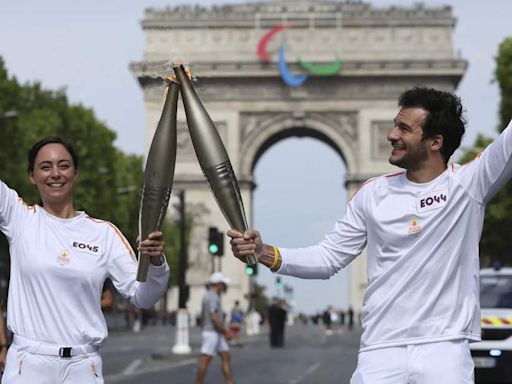 Who is carrying the Olympic torch through Paris? A BTS star, a garbage collector and more