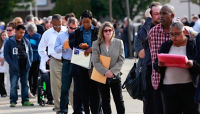 US weekly jobless claims rise to 11-month high