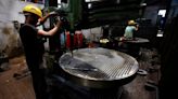 PMI signals factory activity eased a tad in July; price pressures mount