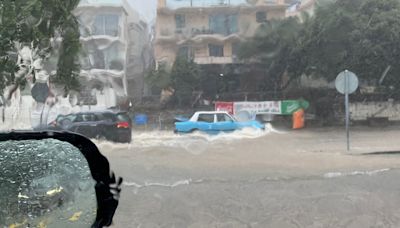 黃雨警告｜大嶼山雨勢特別大 水浸半個車胎變「水上的士」