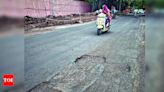 Potholes and Broken Drainage Lids Pose Risk to Motorists in Pune | Pune News - Times of India