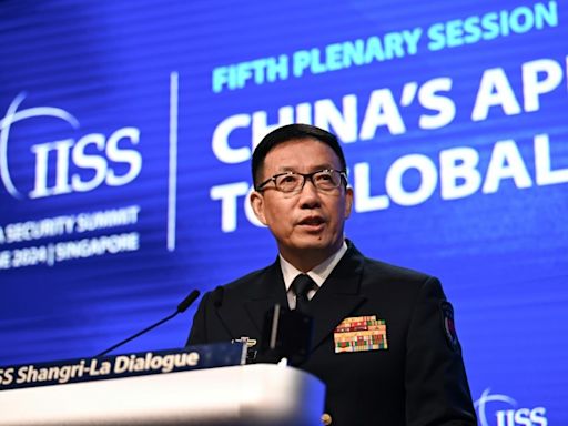 China defence chief says Beijing ready to 'forcefully' stop Taiwan independence