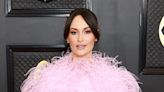 Kacey Musgraves Is Pretty in Pink With Bodysuit and Feathered Cape at the Grammys