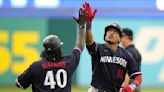 Royce Lewis hits a grand slam, drives in 6 as the AL Central-leading Twins crush Cleveland 20-6