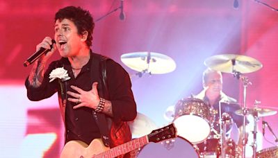 Green Day lead singer Billie Joe Armstrong spray-paints over A’s logo at Toronto Blue Jays ballpark