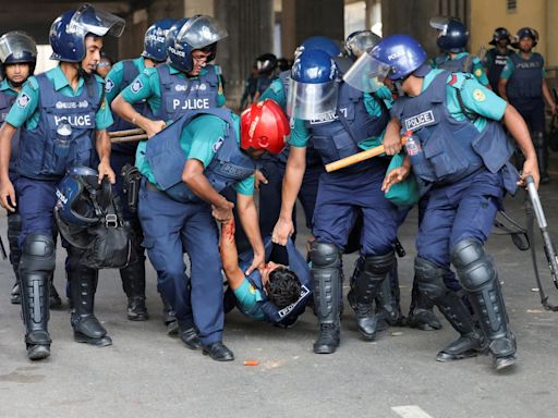 Nearly 100 killed in deadliest day of Bangladesh violence yet as protesters call for Hasina to go