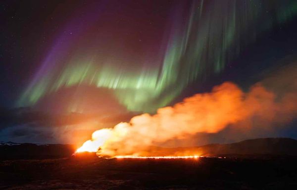 Photographer Captures Northern Lights Over an Erupting Volcano