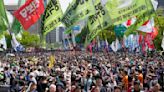 Workers and activists across Europe and Asia hold May Day rallies to call for greater labor rights