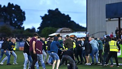 Watch: Violent scenes at Oriel Park as Dundalk and Drogheda fans clash after derby