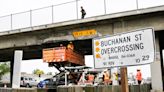 Cars damaged in Corona after truck hits 91 Freeway overpass