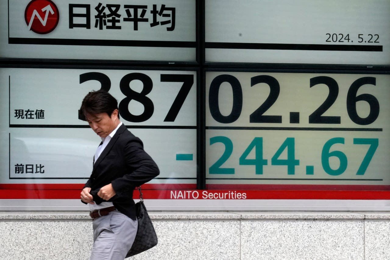 Stock market today: Asian shares mostly higher after Wall Street sets more records