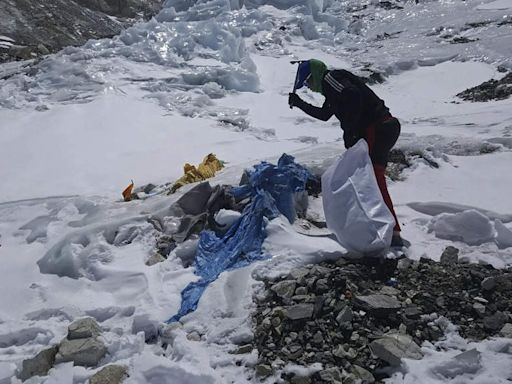 Mount Everest's highest camp littered with frozen garbage and decade old bodies - cleanup is likely to take years - Times of India