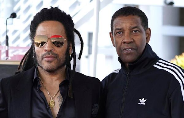 Lenny Kravitz answers video call from 'big brother' Denzel Washington onstage in Italy