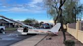 No one hurt when small plane makes crash landing on residential street in suburban Phoenix