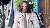Keanu Reeves Seen Walking with Crutches and Ice Pack on His Knee While on Break from Filming