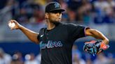 Miami Marlins get out of late jam and hold on to beat New York Mets to open series