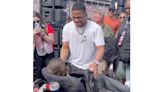 Watch Nelly Give His Jacket to Fan with Disabilities at Bank of America Roval 400 NASCAR Race in Sweet Video