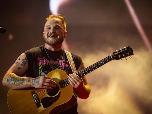 Zach Bryan Plays It Cool as Fan Rushes Stage During New Orleans Concert