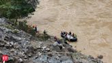 Search for dozens missing after landslide sweeps buses into Nepal river is suspended - The Economic Times