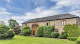 Imposing Grade II listed barn conversion goes on the market - complete with stable block