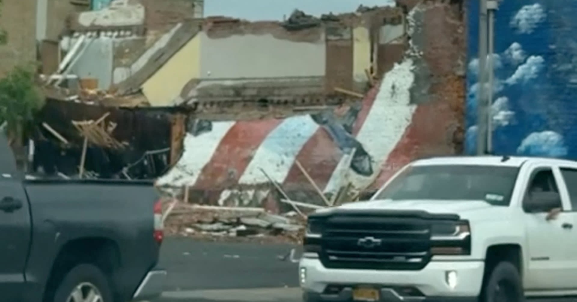 New York storm topples B-52 bomber, tears roof off church