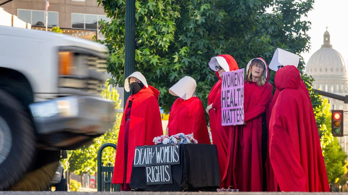 ‘Women are not free’: Idaho protesters rally in Boise with ‘Handmaid’s Tale’ costumes