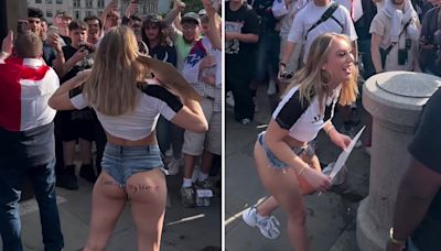 Female fan flashes huge crowd of England supporters then gets handshake from man