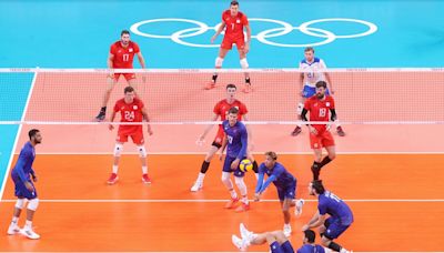 Why does one volleyball player wear a different colour jersey?