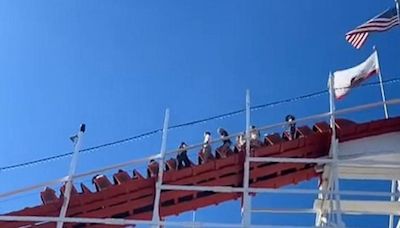 Roller coaster riders forced to climb down ride in emergency evacuation