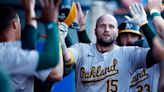 Brown, Rooker help A's clinch first winning month since July '22