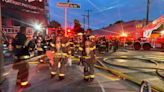 Woman dead, 3 injured in vacant apartment building fire in north Seattle